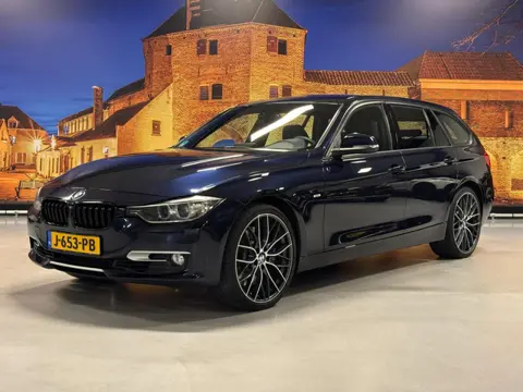 BMW 3-serie Touring 335i xDrive High Exe Aut Leer Camera Xenon