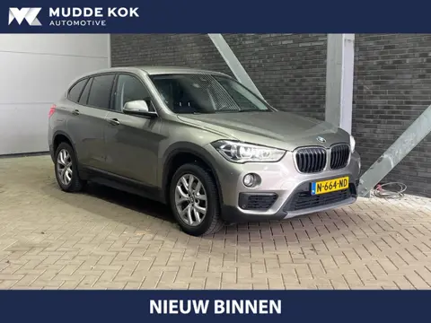 BMW X1 sDrive18i High Executive | Trekhaak | Stoelverwarming | Getint Glas | PDC V+A