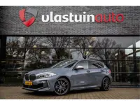 BMW 1-serie M135i xDrive High Executive 306pk , Kuipstoelen, Harman/Kardon, Head-up display, Sfeerve