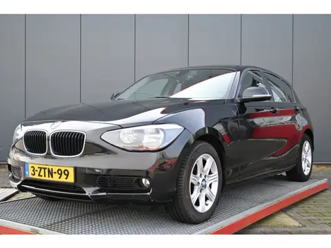 BMW 1-serie 116i Business schade zie fotos (bj 2015)