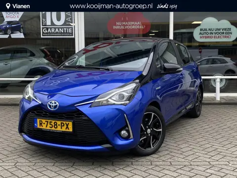 Toyota Yaris 1.5 Hybrid Bi-Tone Navi, Climate & Cruise control. Hoge instap zeer nette auto.