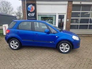 Suzuki SX4 1.6i "Exclusive" Airco - Trekhaak -Lm velgen - Apk 13-03-2027 !!