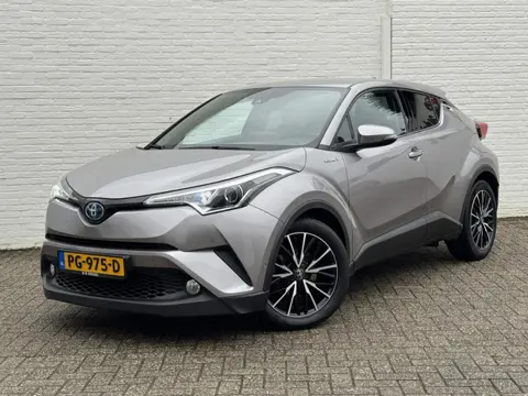Toyota C-HR 1.8 Hybrid Executive Dealer onderhouden Cruise Climate Navi Stoelverwarming Bluetooth Ca