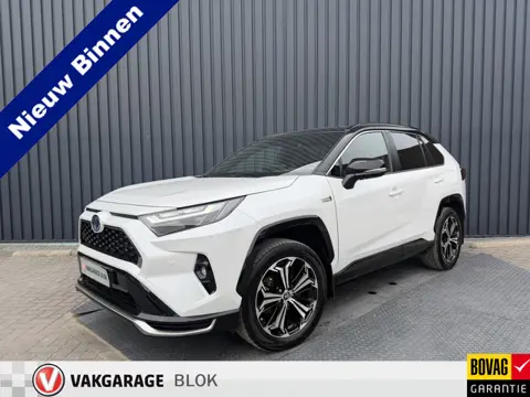 Toyota RAV4 2.5 Plug-in Hybrid AWD Bi-Tone Plus | Trekhaak | Stoel koeling+verwarming | 26.000 km | 