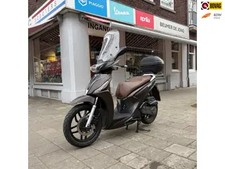 Kymco Snorscooter Kymco People's Bruin - 11/3/2020 - 17175 km - Origineel windscherm, handkappen en 