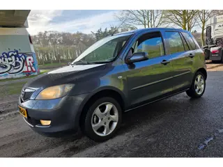 Mazda 2 1.4 Touring - APK t/m 09-03-2027 - Airco - NL Auto -