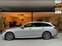 Mercedes-Benz C-klasse Estate 300 e AMG Line Garantie Trekhaak Massage Pano Ambient 360 Blindspot El