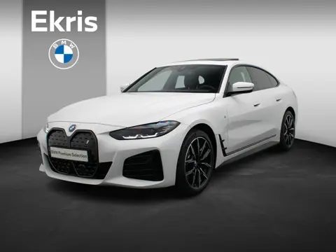BMW i4 eDrive40 M Sportpakket Pro | Stuurwielrand Verwarmd | Achteruitrijcamera | Schuifdak | DAB | 