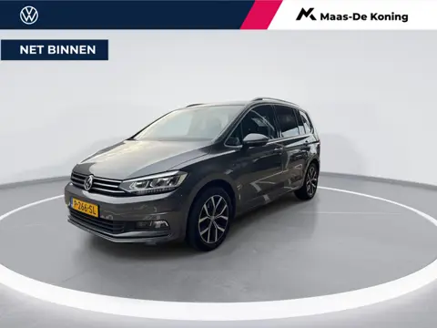 Volkswagen Touran 1.4 TSI 150pk DSG Highline 7p · Camera · Wegklapbare Trekhaak · Apple/Android Car 