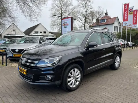 VOLKSWAGEN TIGUAN 1.4 TSI SPORT&STYLE / SCHUIFDAK / NAVI / CRUISE CTR. / TREKHAAK / 17'' LM-VELGEN