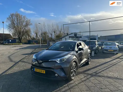Toyota C-HR 1.8 Hybrid Bi-Tone Stoelverwarming Sfeer Vol Leder Vol historie Camera!!!