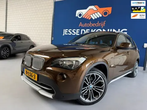 BMW X1 SDrive18i Executive / bj.2010 / kleur: bruin / navigatie / climate / cruise / airco / NAP met