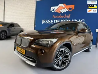 BMW X1 SDrive18i Executive / bj.2010 / kleur: bruin / navigatie / climate / cruise / airco / NAP met