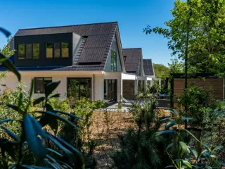 Luxe wellness villa met sauna en sunshower dichtbij strand en De Koog