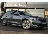 BMW 3 Serie Touring 330e xDrive Sport line Pano Laser HuD 360 ACC El.Haak Hifi Ambient Bliss