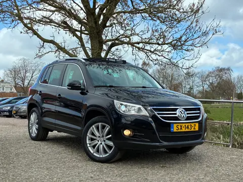 Volkswagen Tiguan 1.4 TSI Sport&Style 4Motion | Pano/schuif dak + Xenon + Navi + Clima + Cruise nu €
