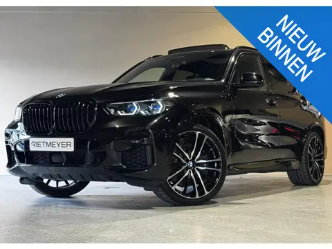 BMW X5 xDrive45e High Executive |Pano |Carbon int. |M perf. zetels |Skylounge |Luchtvering |HUD |Sto