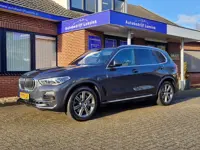 BMW X5 XDrive45e High Executive H&K Panorama Laser Trekhaak Head Up Comfortstoelen ACC Warmte-comfor