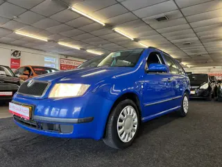 Skoda Fabia Combi 1.4-16V Comfort. AUTOMAAT, cruise control, airco, BT/touchscreen, trekhaak en meer