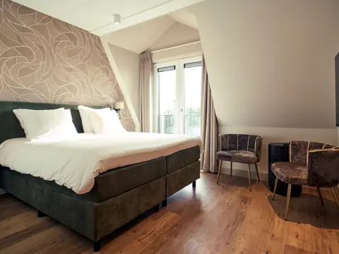 Luxe hotelkamer met bad