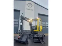 Volvo minikraan met 3 bakken