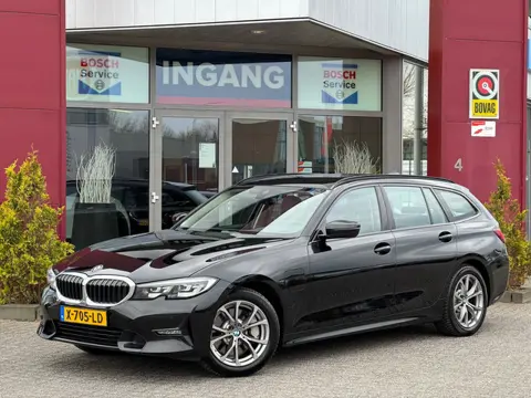 BMW 3 Serie Touring 330e High Executive (bj 2020)