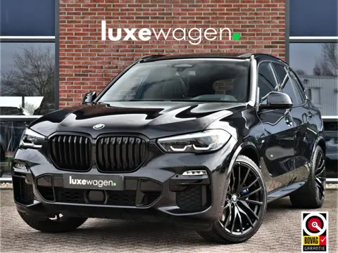 BMW X5 xDrive40d M-Sport 7pers Pano Luchtv ACC Trekh H/K HUD 22inch 4WS Comf-seat