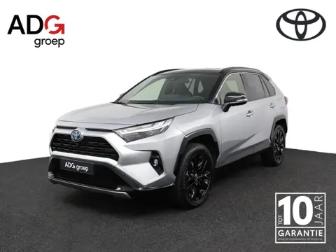 Toyota RAV4 2.5 Hybrid AWD Bi-Tone | Half leder | stoelverwarming | Navigatie | Apple Carplay/Androi