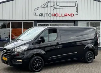FORD TRANSIT CUSTOM 2.0 TDCI 96KW 131PK L2H1 EURO 6 AIRCO/ CRUISE CONTROL/ NAVIGATIE/ 100% DEALERONDERHOUDEN