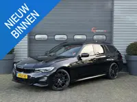 BMW 3-serie Touring 330i High Executive M-Sport | Panoramadak | Camera | 20 Inch Lichtmetalen Velgen