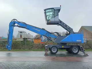 Fuchs MHL 331 overslagkraan waste handler umslag bagger