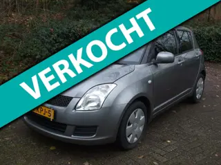 Suzuki Swift 1.3 Base airco 5 drs 130 dkm grijs