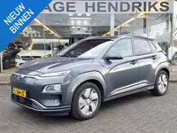 Hyundai Kona EV Premium 64 kWh | SOH: 94,6% | Leder | Warmtepomp | Adaptive CC | Navi | Camera |