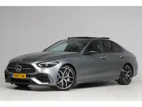 Mercedes-Benz C-klasse 180 AMG Line Night Pakket Magno Grey | panoramadak | laser led | elek. stoele