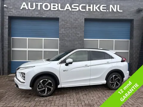 Mitsubishi Eclipse Cross 2.4 PHEV Instyle, trekhaak, head-up, pano, leder, compleet!