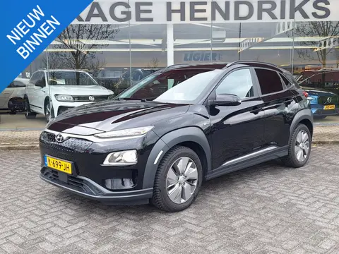 Hyundai Kona EV Fashion 64 kWh | SOH: 95,2% | 3 Fase | Warmtepomp | HUD | Navi | Adaptive CC | Blind