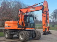 Doosan Dx 140 W (bj 2011)