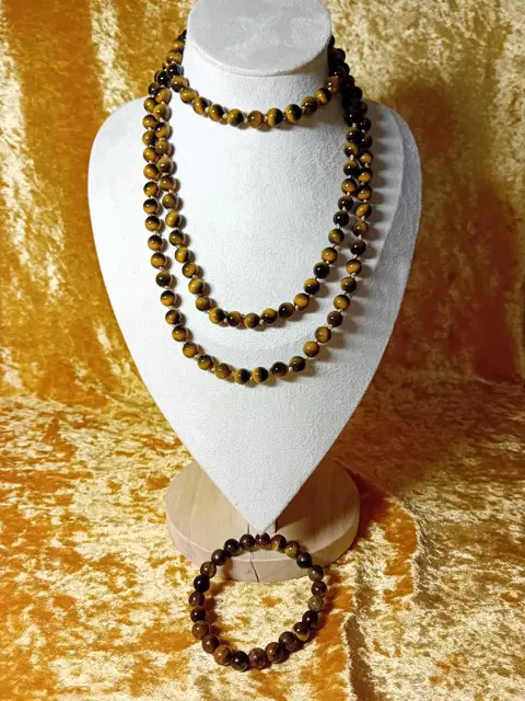 Mooie lange tijgeroogketting met rekbare armband.