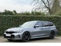 BMW 3 Serie Touring 330e | M-Sport | Panorama | 19" | Trekhaak | Harman/kardon