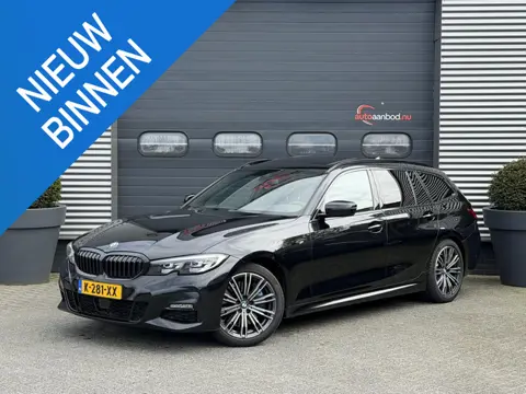 BMW 3-serie Touring 320i High Executive M-Sport | Panoramadak | Camera | Head-Up Display | DAB | Sto
