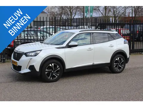 Peugeot 2008 1.2 PureTech Allure, Lesauto met dubbele bediening