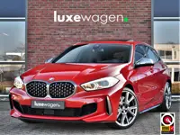 BMW 1-serie M135i xDrive Pano M-zetels ACC H/K HUD NL-auto El-klep