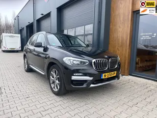 BMW X3 XDrive20i High Executive l HUD l pano l trekhaak l leer l X-LINE