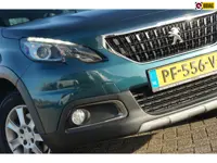 Peugeot 2008 1.2 PureTech Allure | Emerald Crystel | AppleCarplay/Clima/Cruise/Camera - Keurig!
