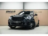 BMW X5 xDrive45e High Executive | M uitgevoerd | Stoelmassage | Sky Lounge | Head-Up | Carbon |
