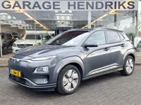 Hyundai Kona EV Premium 64 kWh | SOH: 94,6% | Leder | Warmtepomp | Adaptive CC | Navi | Camera |