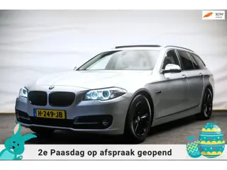 BMW 5-serie Touring 520d High Executive Automaat [ Panoramadak Luchtvering Bi-Xenon Trekhaak Leder S