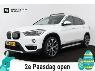 BMW X1 SDrive20i Centennial High Executive (PANORAMADAK, TREKHAAK, STOELVERWARMING, HEAD-UP DISPLAY,