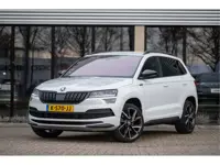 Škoda Karoq 1.5 TSI ACT Sportline Business | Trekhaak | Adapt. Cruise | CANTON | Camera | 19" | Wint