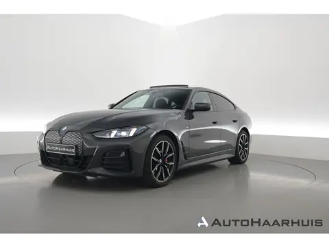 BMW i4 eDrive40 M Sport Pro 84 kWh | S/K-Dak | Elek. Trekhaak | Shadowline | Widescreen | Adapt. Cru